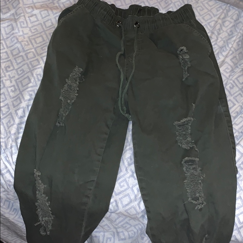 green ripped joggers